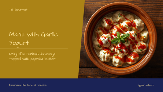 Bowl of Turkish mantı dumplings topped with garlic yogurt, red paprika butter, dried mint, and pul biber